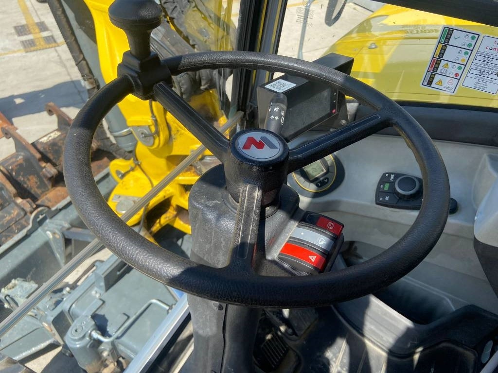 Pelle sur pneus Wacker Neuson EW 100: photos 10